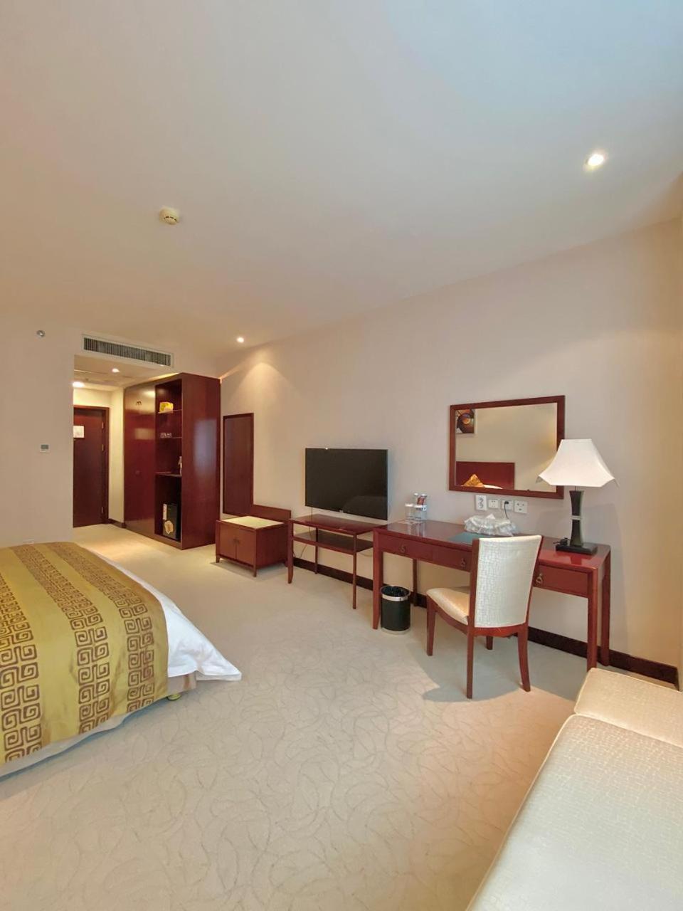 Beijing Palace Soluxe Hotel Astana Exterior foto A room at the hotel