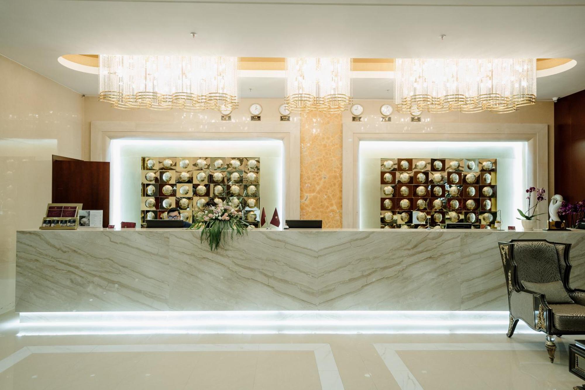 Beijing Palace Soluxe Hotel Astana Exterior foto Reception